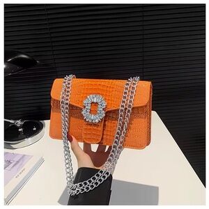 Elegant Orange Croc-Embossed Crossbody Bag with Silver Chain